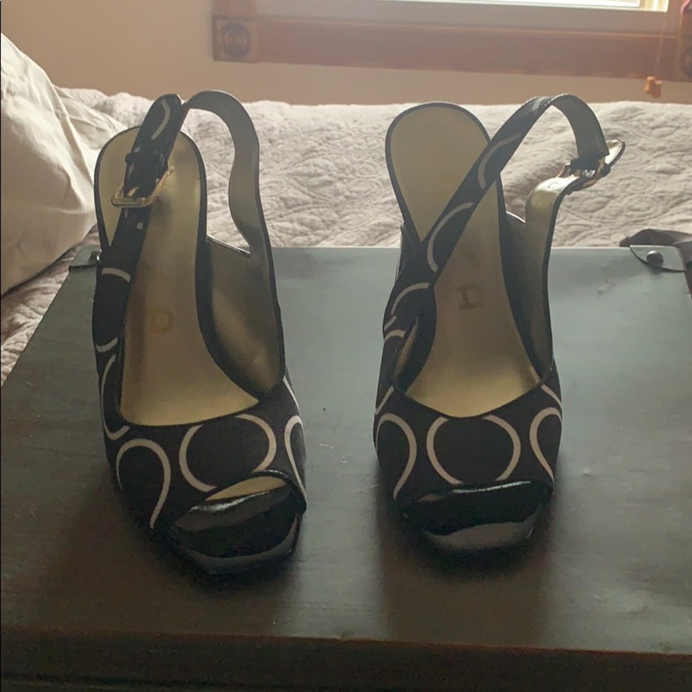 Black and white circle sling backs
